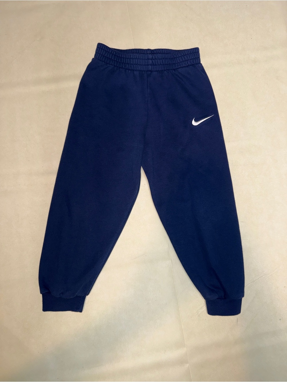 Nike Navy Blue Kids Fleece Sweatpants with White Swoosh